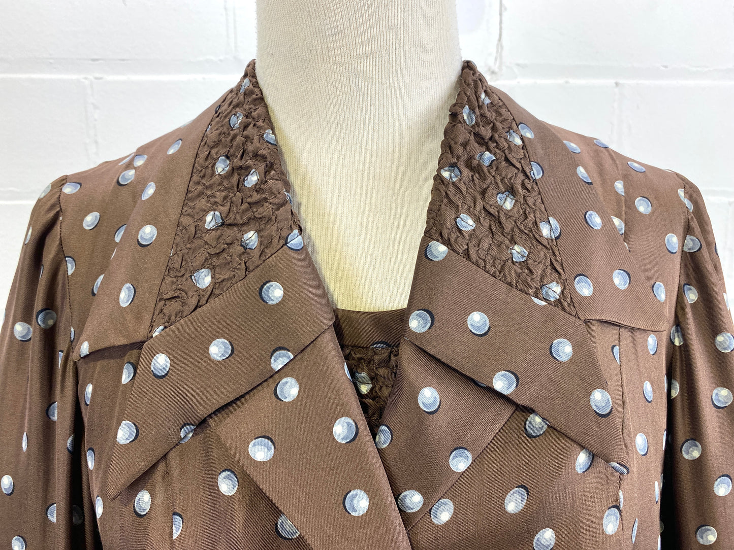 Collar detail on 50s brown silk jacket. Ian Drummond Vintage. 