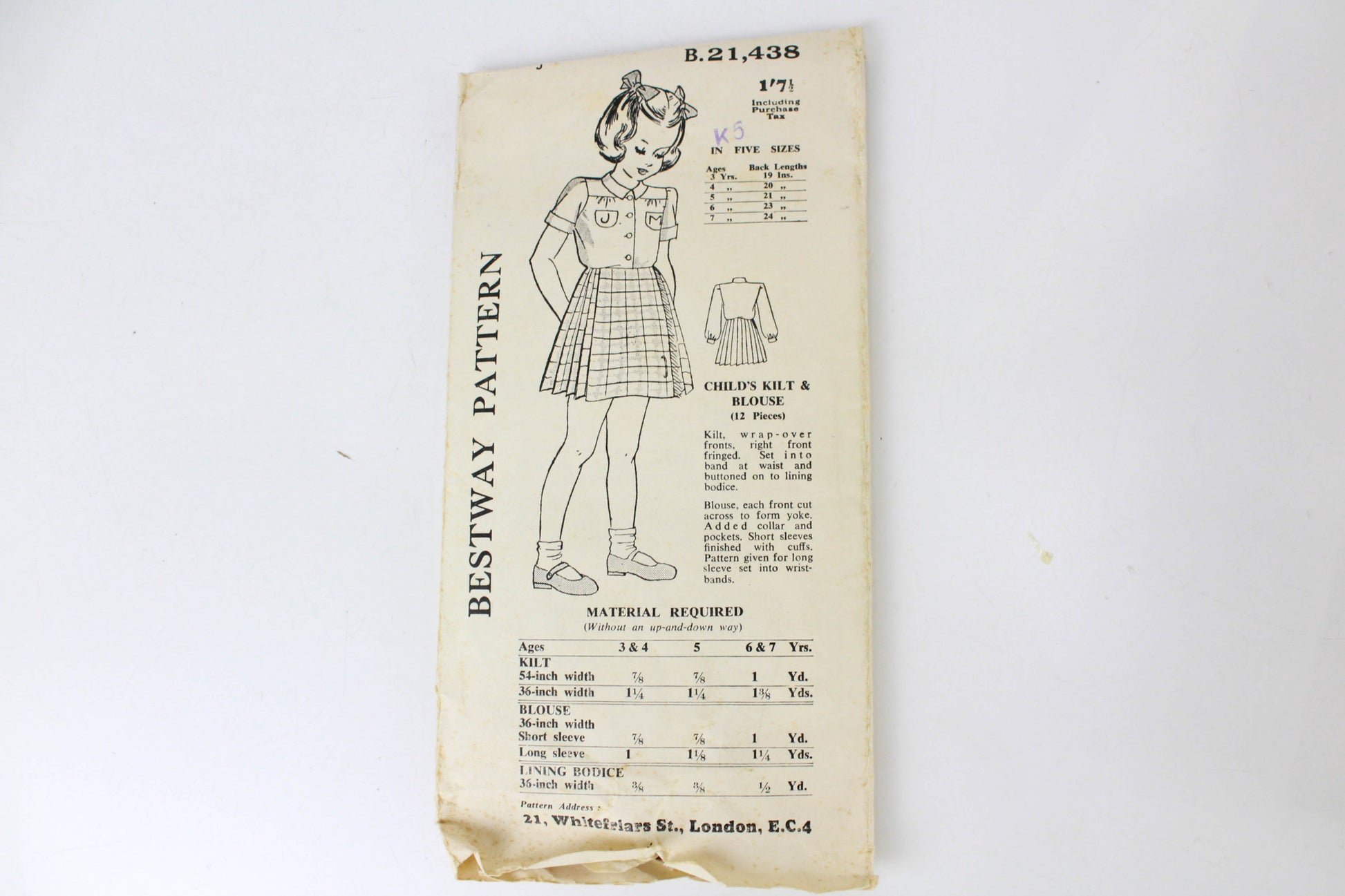 Bestway 21,438; ca. 1940s; Children's Kilt & Blouse; Kilt, wrap-over fronts, right front fringed. Set into band at waist and buttoned on to lining bodice. Blouse, each front cut across to form yoke. Added collar and pockets. Short sleeves finished with cuffs. Pattern given for long sleeve set into wristbands.   LABEL: Bestway  Style #21,438  MEASUREMENTS: ✂--- Allow for some ease.  7 Years: Finished length: 24 in. (61 cm)  CONDITION: Complete. Cut. Unprinted pieces. Instructions on envelope. 