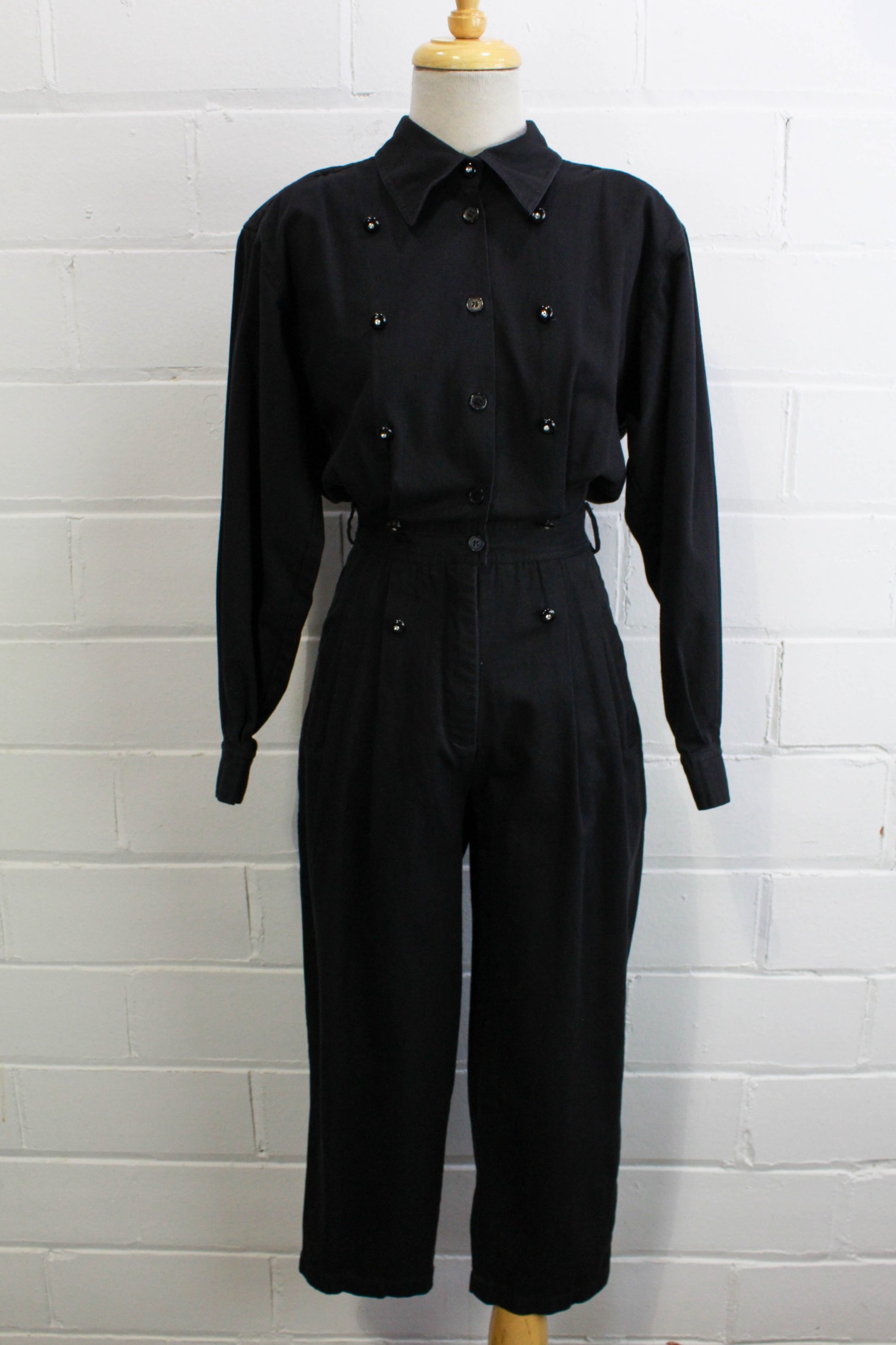 1980s womens jumpsuit black cotton with bib front, collar button up