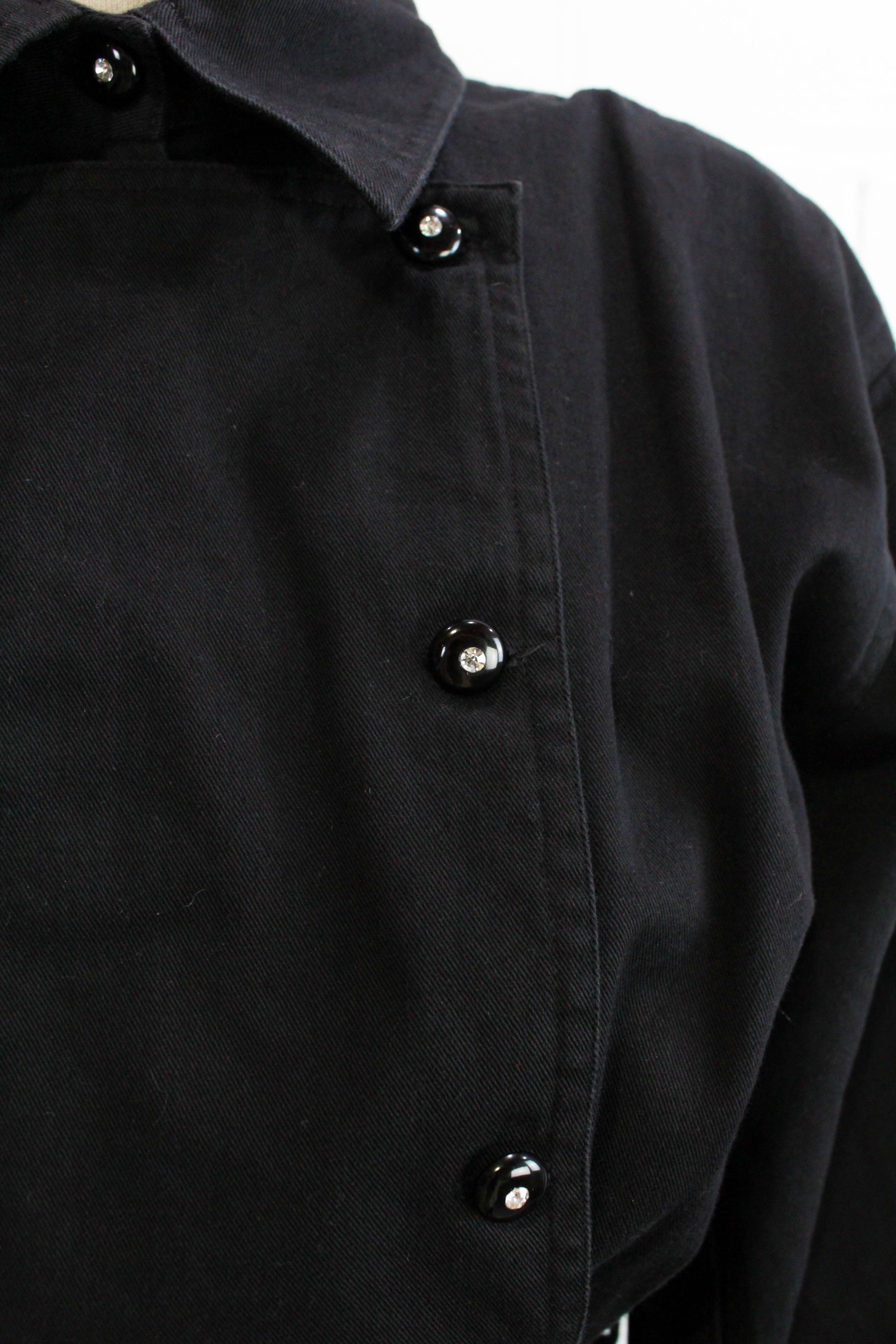 1980s womens jumpsuit black cotton with bib front, collar button up close up rhinestone buttons