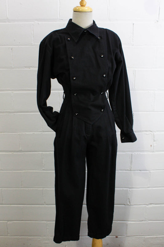 1980s womens jumpsuit black cotton with bib front, collar button up front view