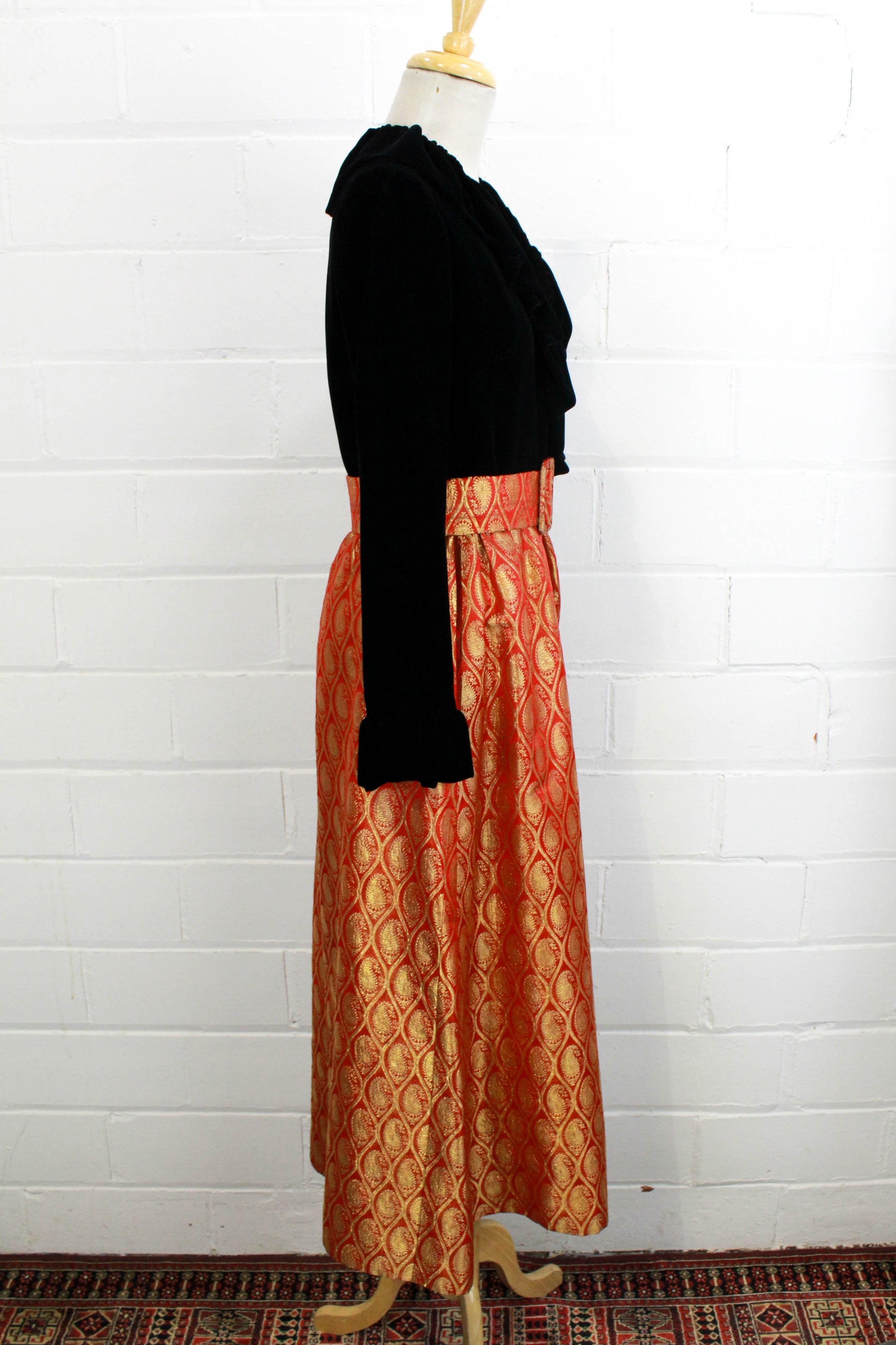 1970s maxi dress black velvet with red and gold metallic brocade skirt, ruffle collar side view
