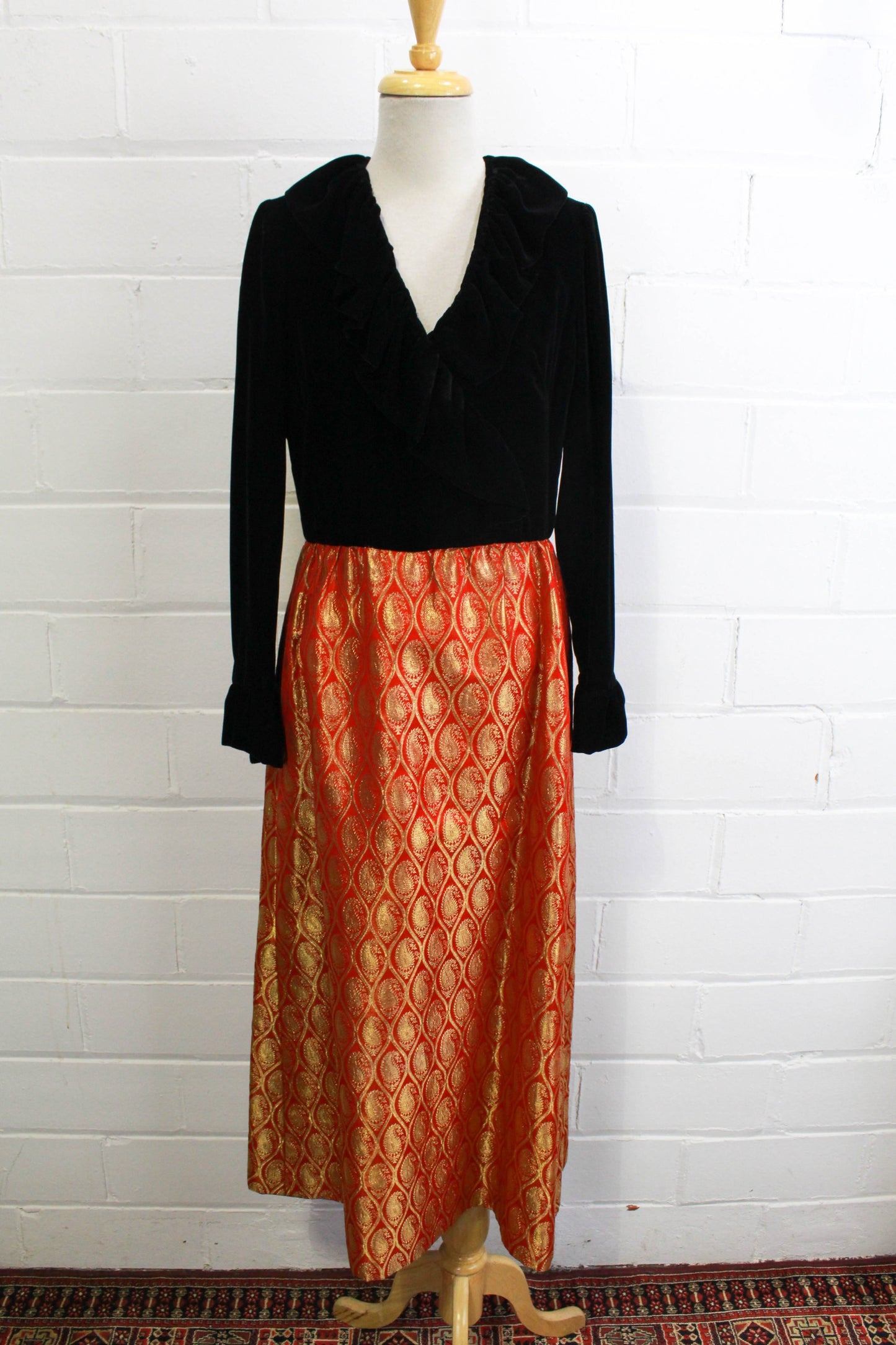 1970s maxi dress black velvet with red and gold metallic brocade skirt, ruffle collar shown without belt front