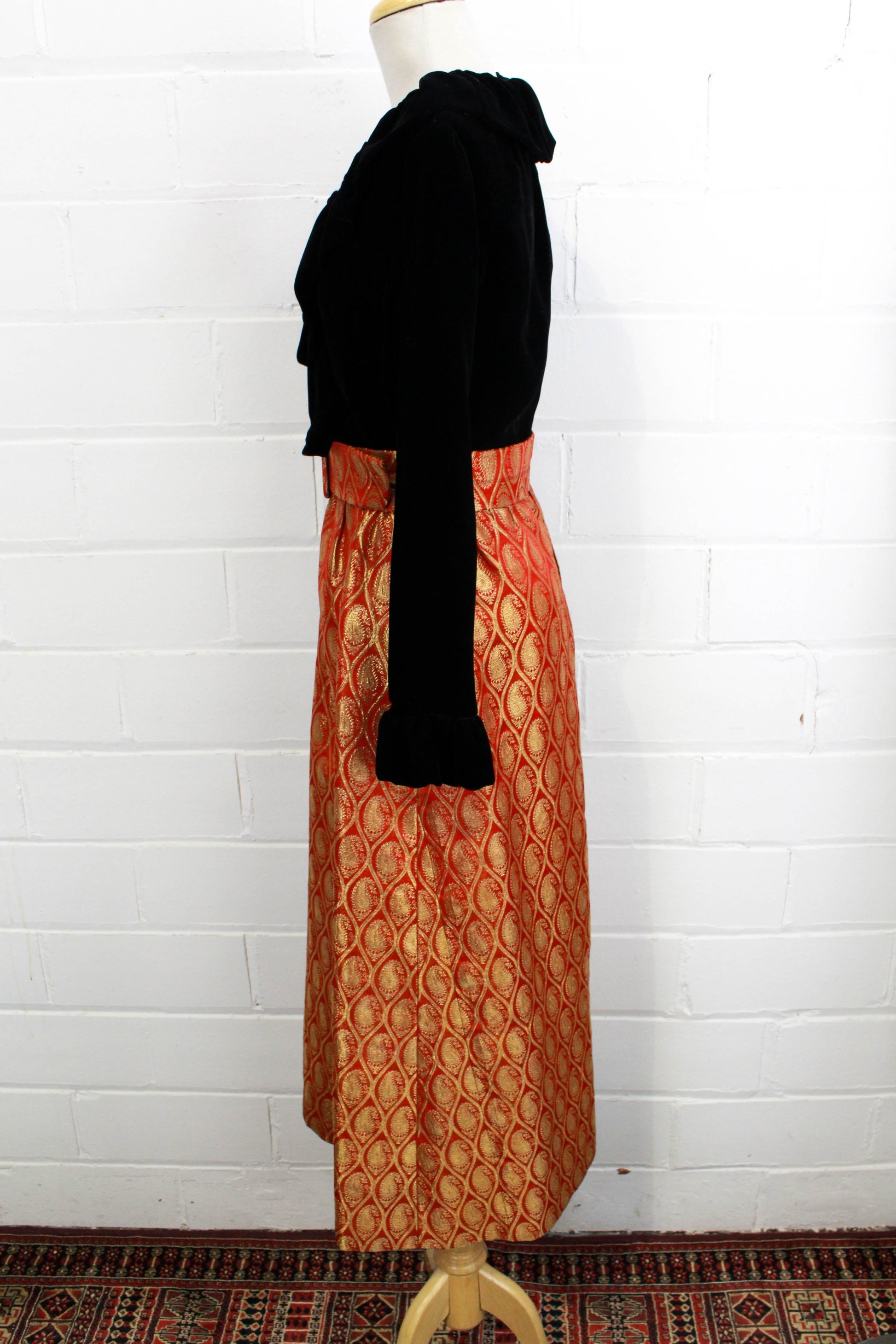 1970s maxi dress black velvet with red and gold metallic brocade skirt, ruffle collar side view