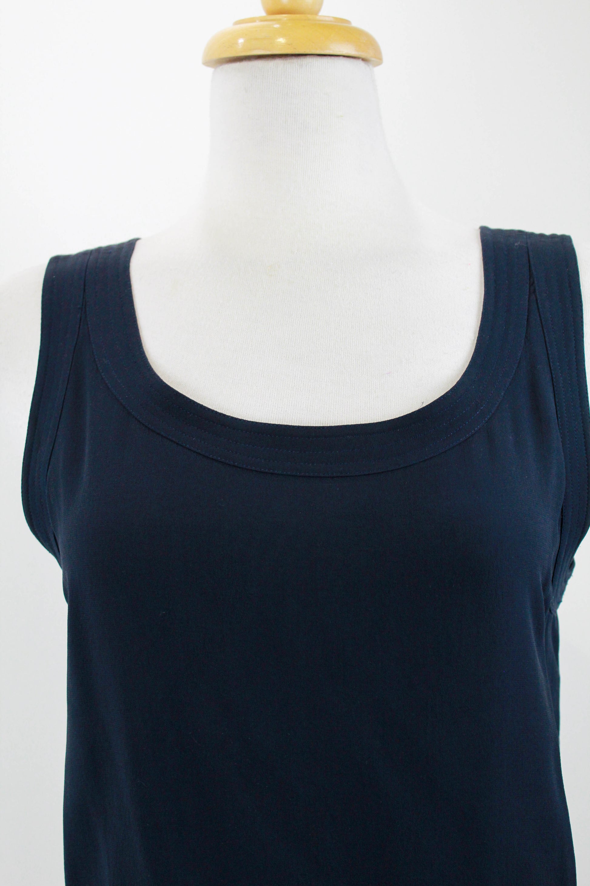 90s chanel boutique navy blue silk sleeveless shell top/blouse with scoop neck, logo button closure at back neck
