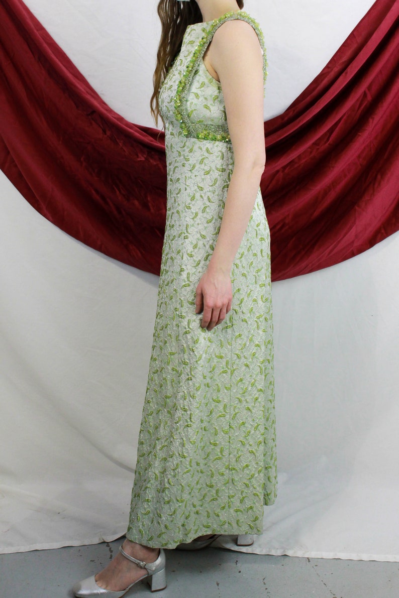 Left side view of green 60s paisley beaded dress. Ian Drummond Vintage. 