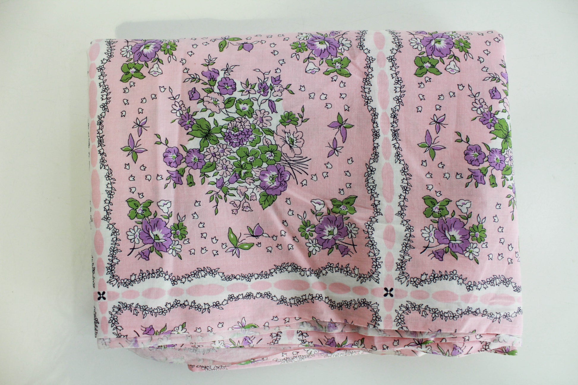 1950s pink floral print cotton sewing fabric square pattern with purple flowers 