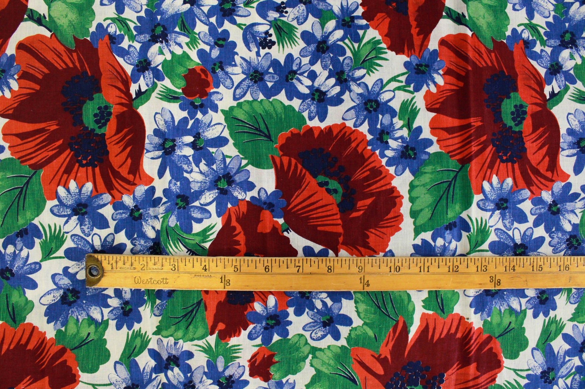 1940s red poppy print against small blue flowers cotton sewing fabric 