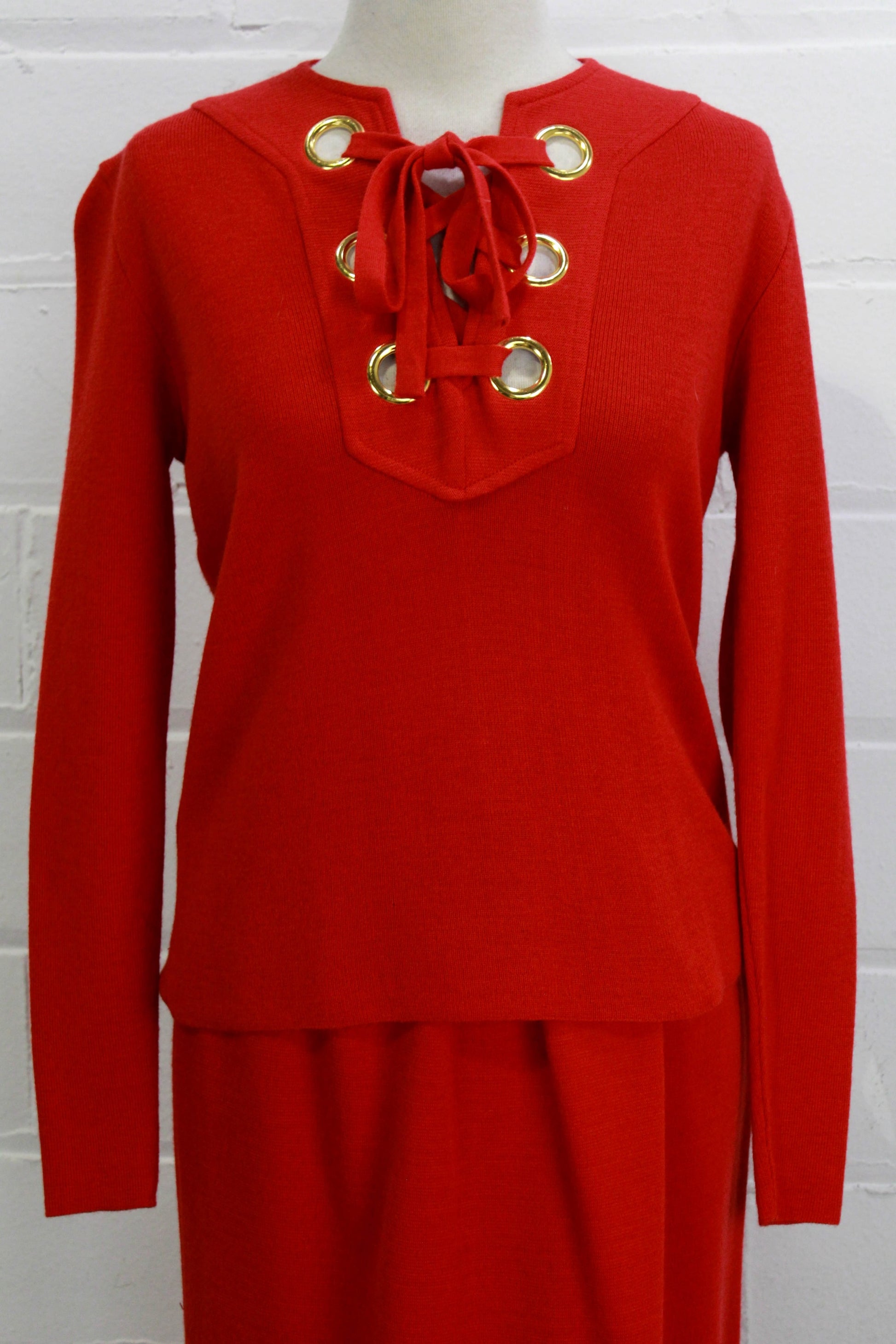 arbe knits italy red wool skirt and top set with gold grommets front view