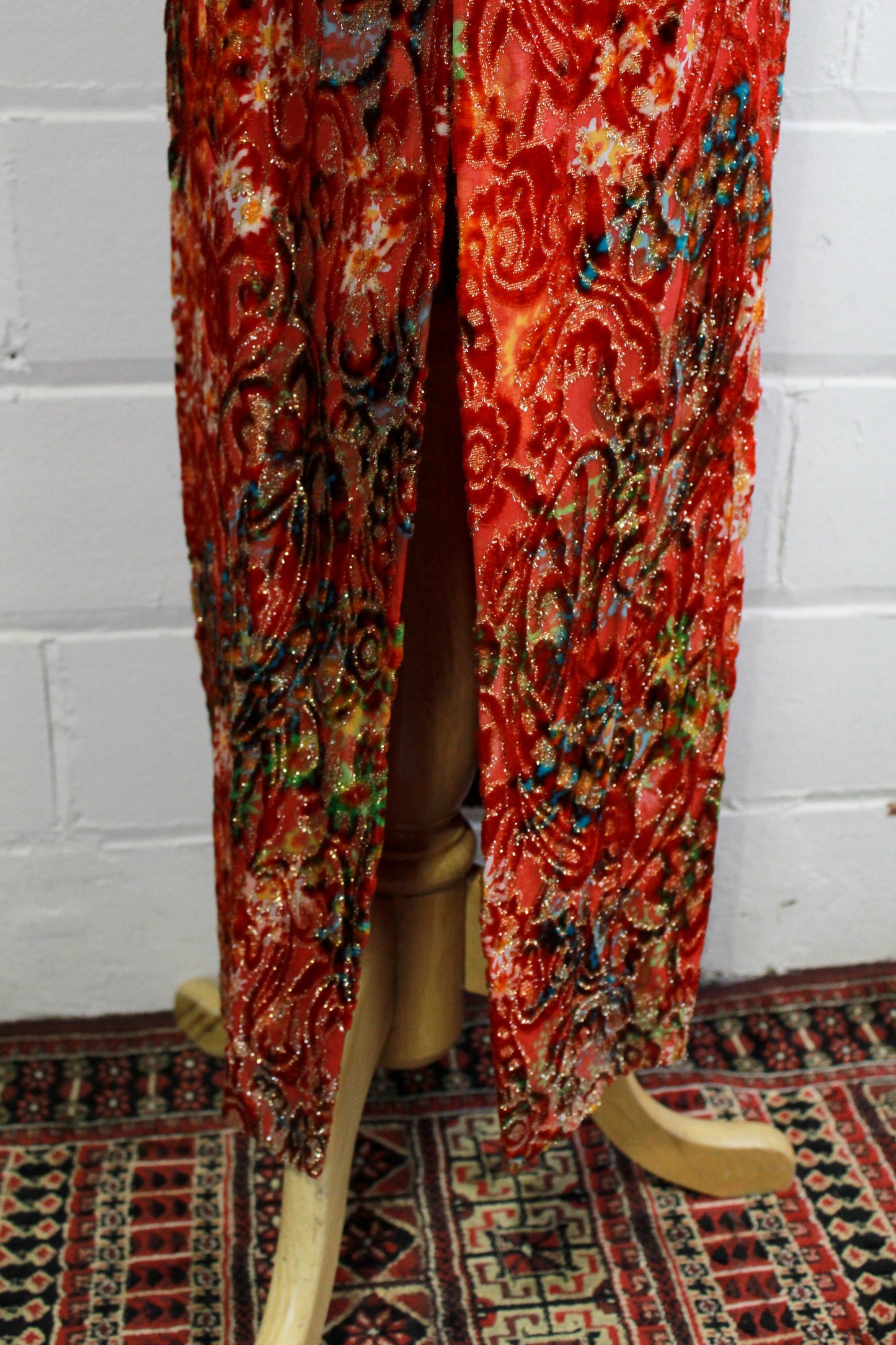 70s maxi dress red and gold velvet metallic floral print close up of slit on side